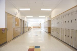 Lockers in empty high school corridor