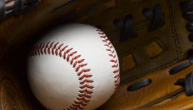 Baseball in glove close-up