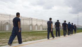 Detainees walk the line inside Homeland...