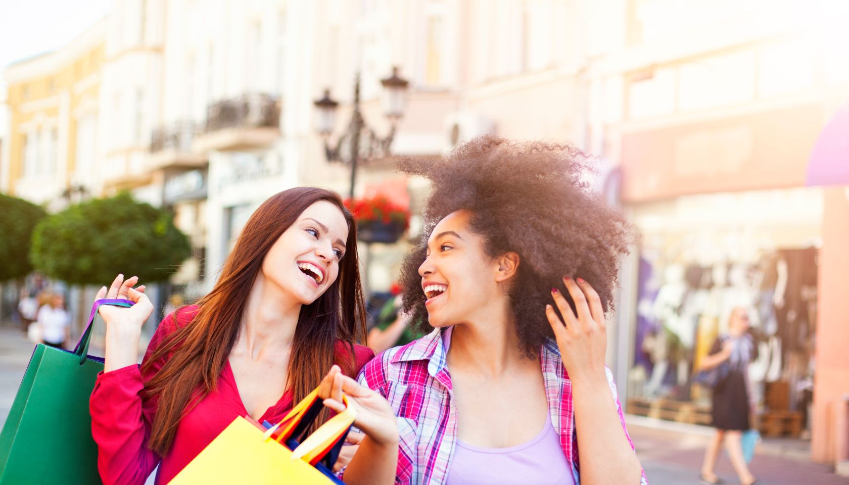 Happy woman shopping in the city