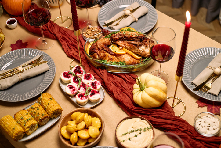 Thanksgiving Dinner Table Displaying Festive Food and Drinks for Friends
