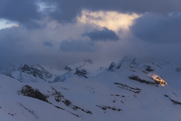 Light on a mountain range in the Northern Rockies in Canada