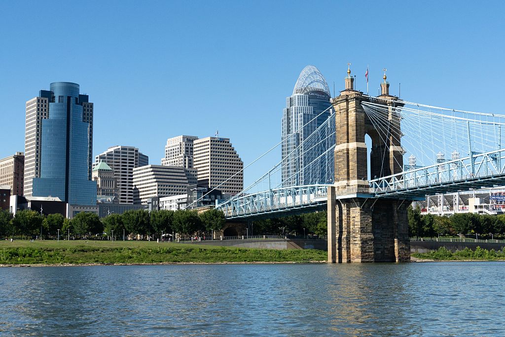 Cincinnati, Ohio skyline and John A Roebling suspension bridge across the Ohio River.