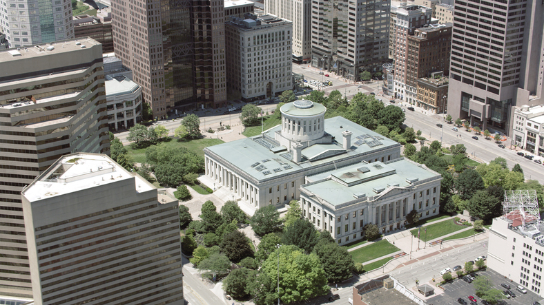 Aerial View Of State Capitol Building With Modern Urban Skyline And Green Spaces In Columbus