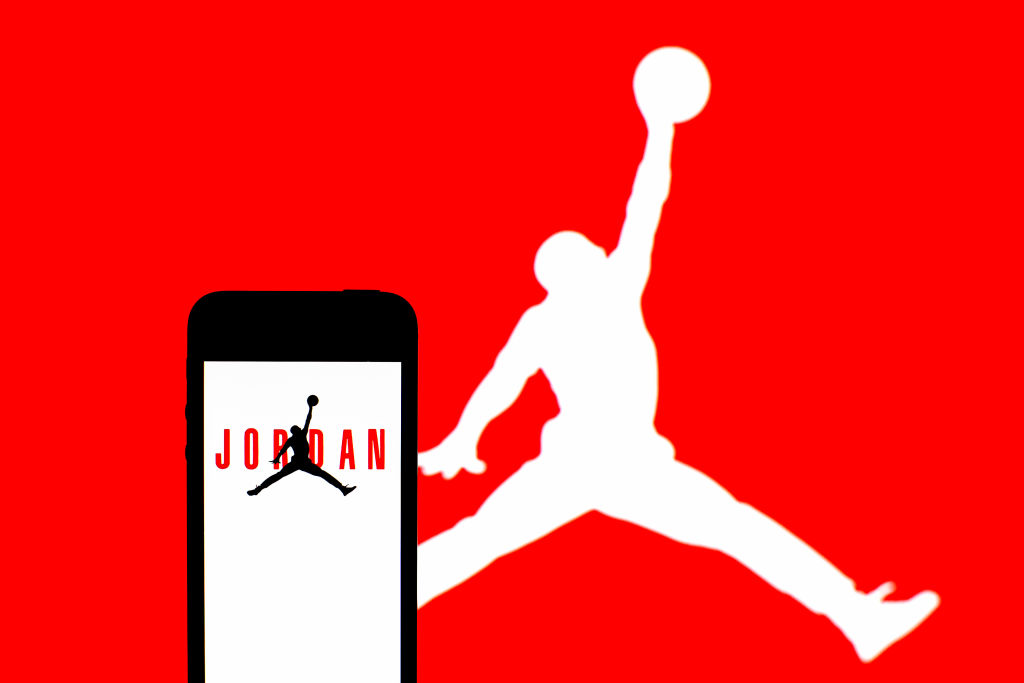 In this photo illustration, an Air Jordan logo seen