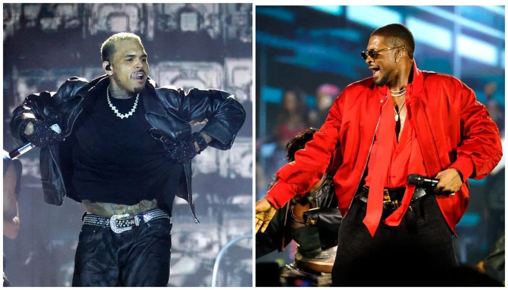 Two male musicians performing on stage, one wearing a black leather jacket and the other a red jacket.
